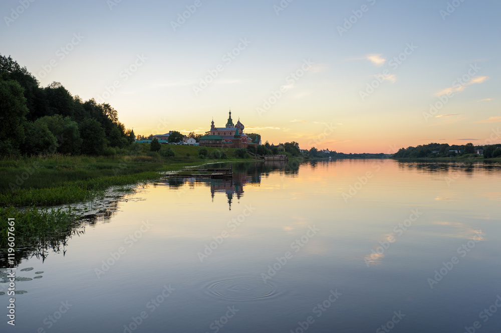 Volkhov river in the evening, Nikolsky Monastery on the backgrou