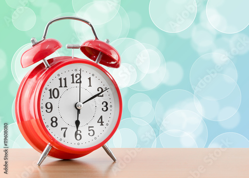 alarm clock with abstract bokeh circle background