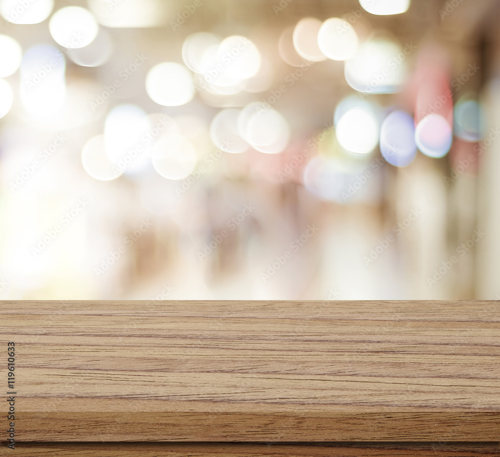 Empty table over blur festive bokeh background Empty table over blur festive bokeh background