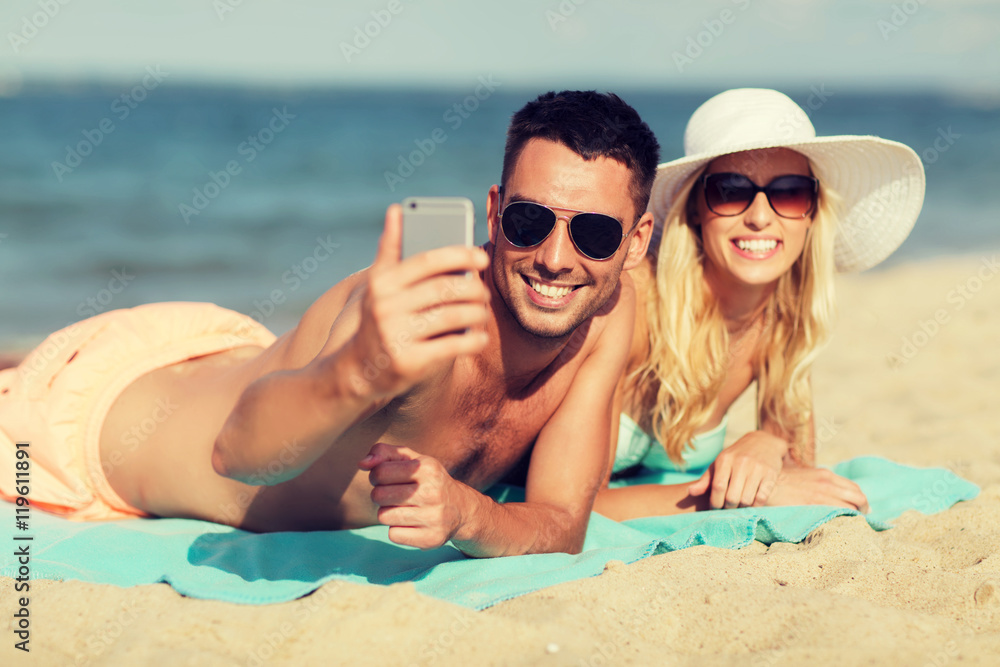 happy couple in swimwear walking on summer beach happy couple in swimwear walking on summer beach