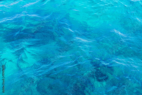 Abstract blue sea water surface reflection background