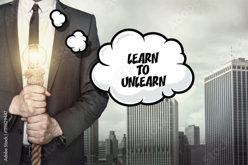 Learn to unlearn text on speech bubble with businessman photo