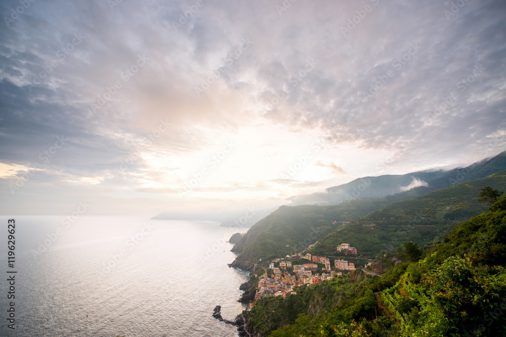 Top view on Riomaggiore old coastal town in the Liguria region of Italy. Wide angle view with mountains