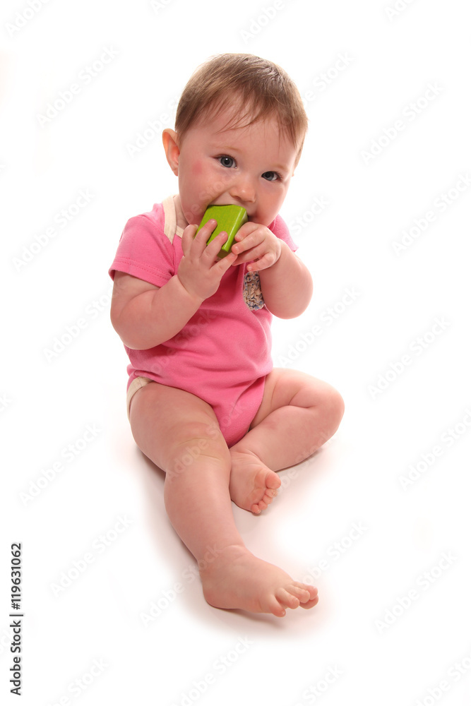 Baby girl playing with wooden block Baby girl playing with wooden block