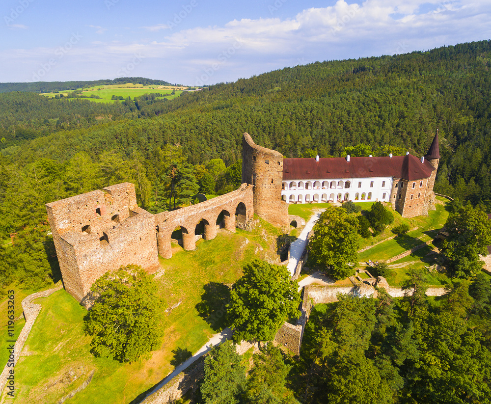 Gothic castle Velhartice in National Park Sumava. Aerial view to medieval monument in Czech Republic. European landmarks from above.