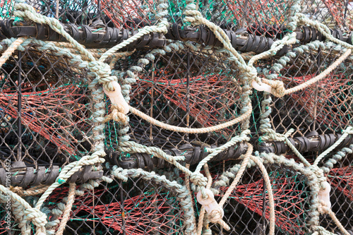 Lobster or crab pots stacked on jetty