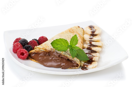 Crepes with chocolate cream and banana