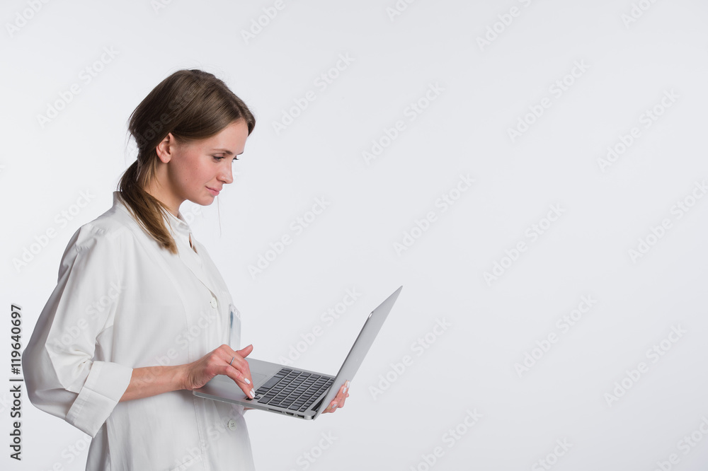 medical doctor woman smile hold tablet pc, using computer. nurse Isolated over white background medical doctor woman smile hold tablet pc, using computer. nurse Isolated over white background