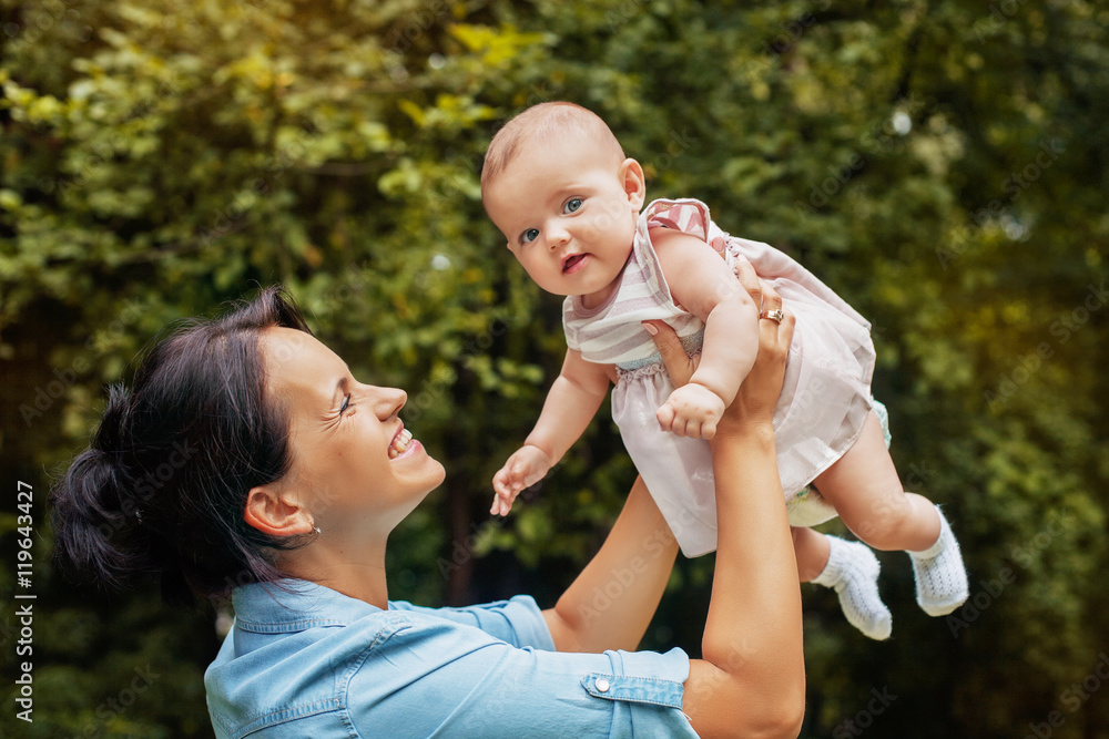 beautiful little girl with her mother. The concept of family and love. beautiful little girl with her mother. The concept of family and love.