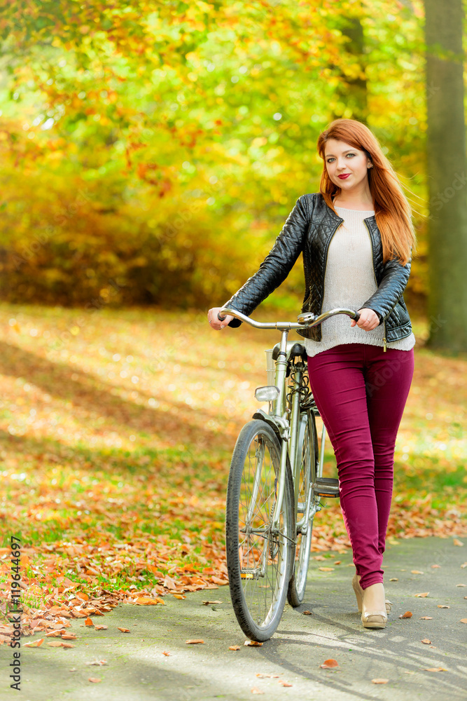 Fototapeta premium Young girl with bike.