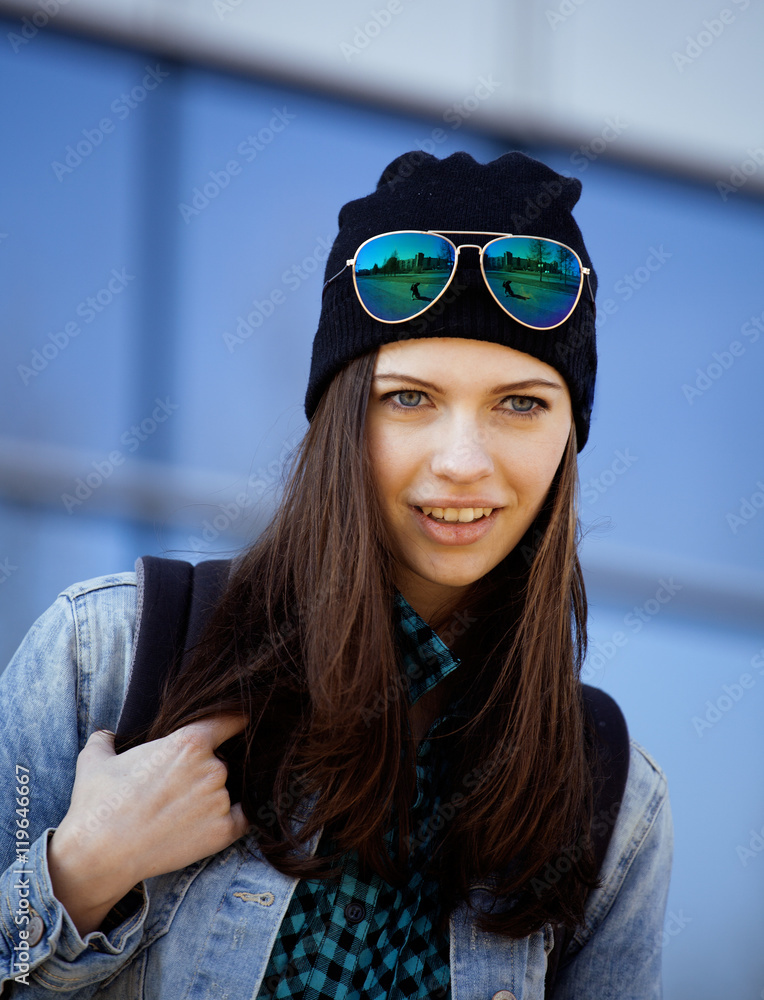 young pretty girl near business building walking young pretty girl near business building walking