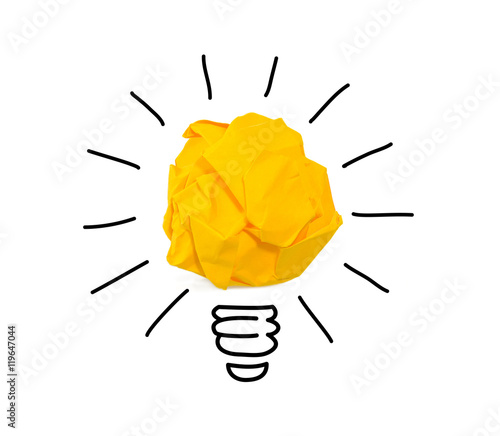 Inspiration crumpled yellow paper light bulb idea