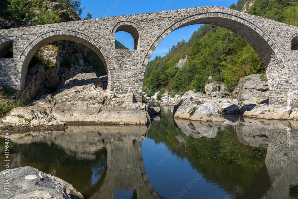 Amazing Reflection of Devil's Bridge in Arda river, Kardzhali Region, Bulgaria