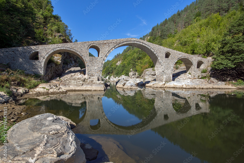 Amazing Reflection of Devil's Bridge in Arda river, Kardzhali Region, Bulgaria