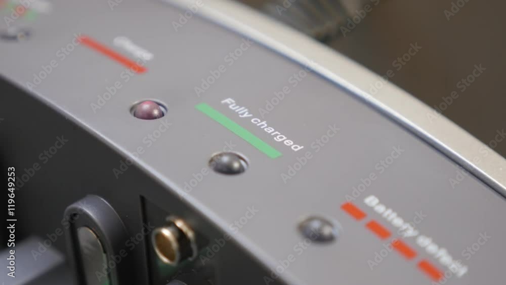 Universal AA and AAA battery charger background close-up 4K 2160p 30fps UHD tilting footage - Different batteries charger modern technology device slow tilt 4K UltraHD video Universal AA and AAA battery charger background close-up 4K 2160p 30fps UHD tilting footage - Different batteries charger modern technology device slow tilt 4K UltraHD video