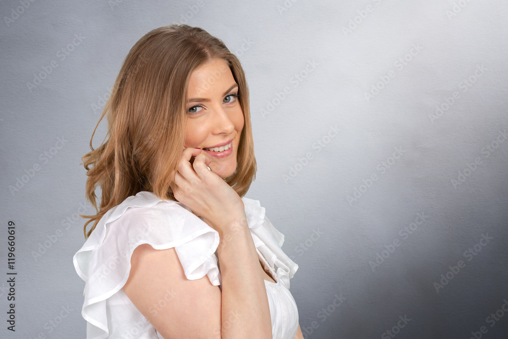 Cheerful woman talking on the phone isolated
