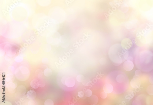 Spring abstract blurred bokeh light yellow background.