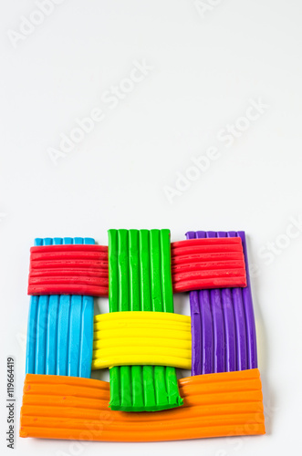 Colorful clay on white background select focus