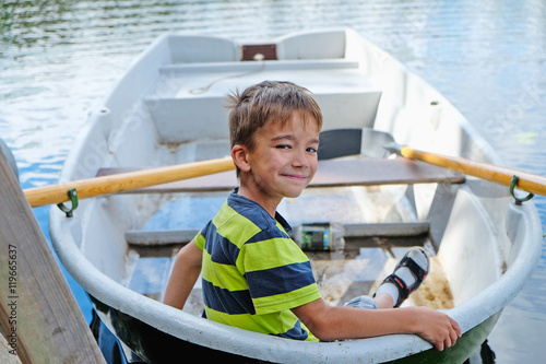 portrait of a boy in a boat