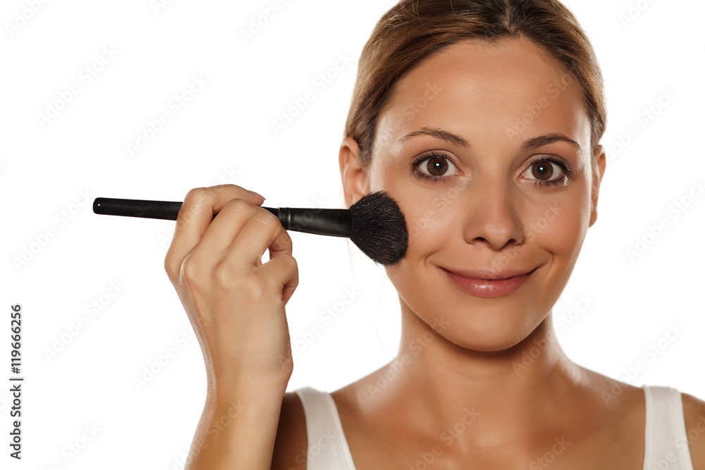 young beautiful woman applied blush young beautiful woman applied blush