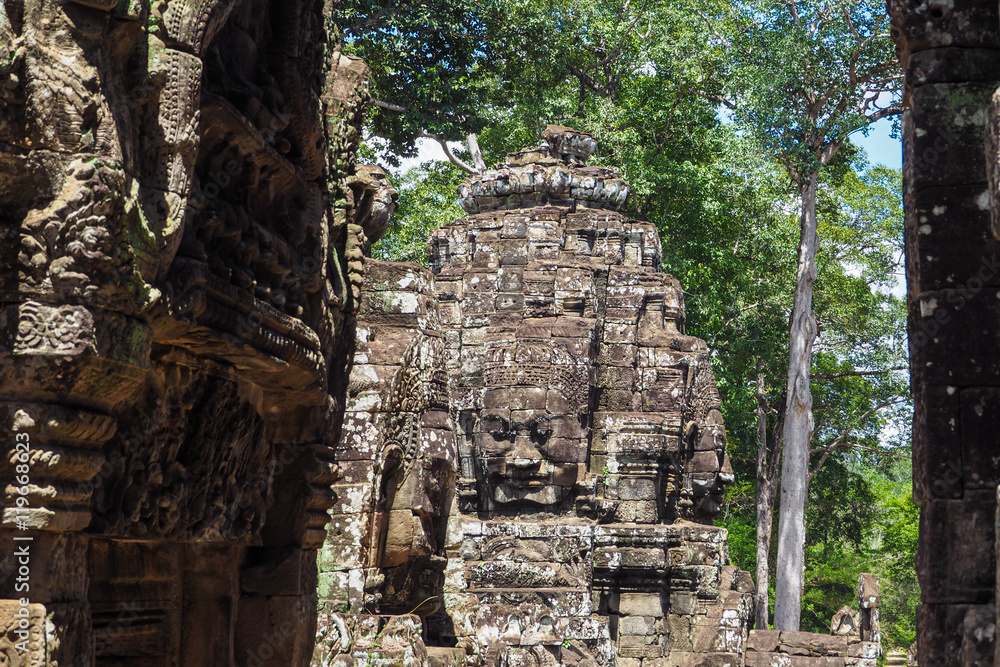 Gigantic Stone Face of Bayon in Angkor Thom, Cambodia Gigantic Stone Face of Bayon in Angkor Thom, Cambodia