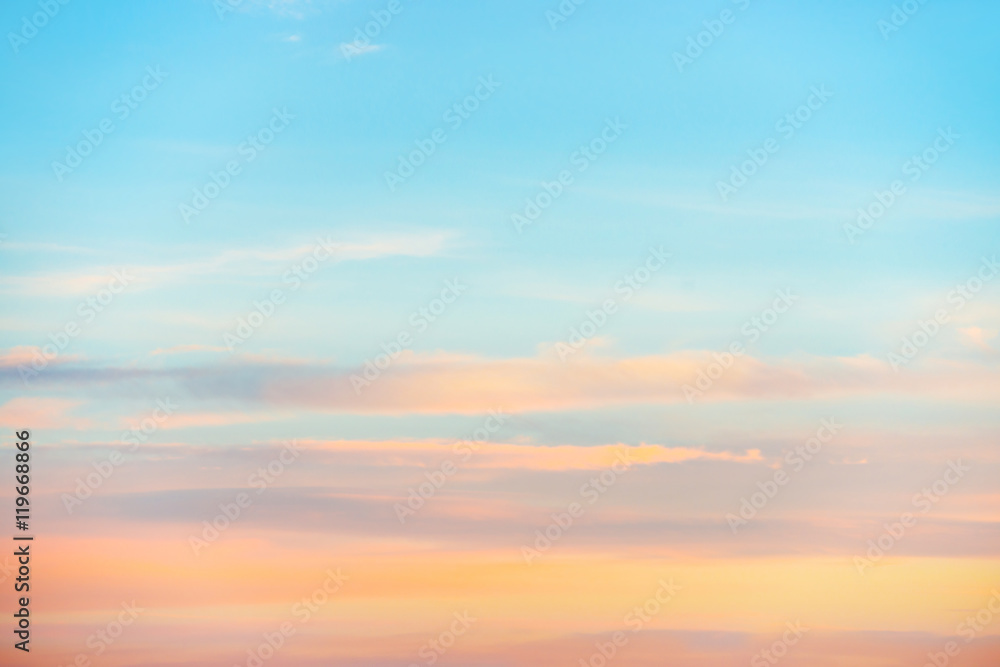 Obraz premium Pale sunset sky with pink, orange and red colors