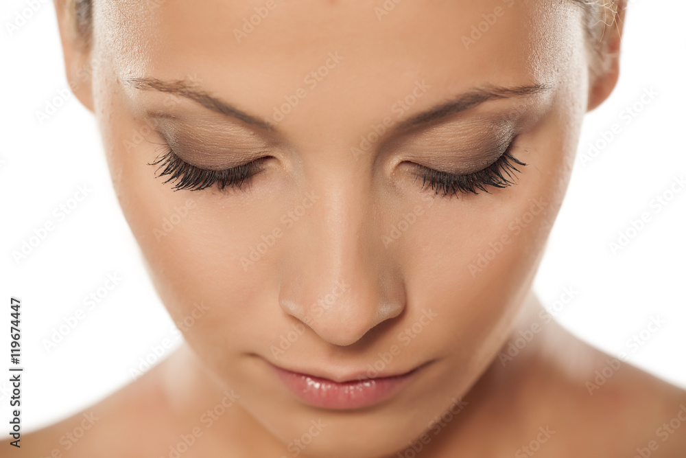 top view of a beautiful woman's face with natural lashes