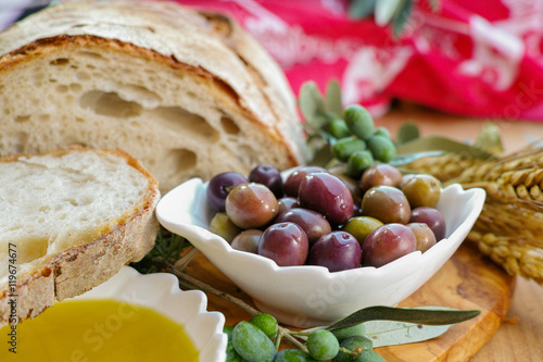 Traditional italian appetizer - fresh homemade bread, extra virgin olive oil