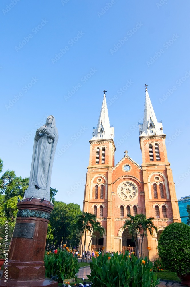 Saigon Notre-Dame Cathedral Basilica on blue sky background in Ho Chi Minh city, Vietnam. Ho Chi Minh is a popular tourist destination of Asia.