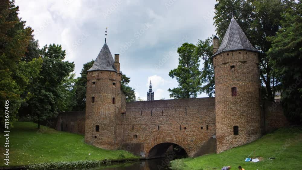 Boat passing a historic medieval city gate in Amersfoort, the Netherlands, 4K time lapse Boat passing a historic medieval city gate in Amersfoort, the Netherlands, 4K time lapse