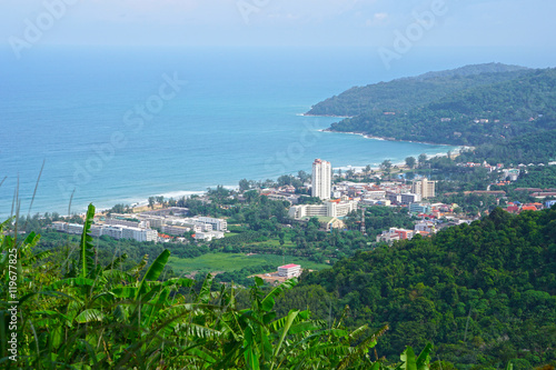 High scenic view point landscape of resorts on mountain and blue Andaman Sea in Phuket island of Thailand