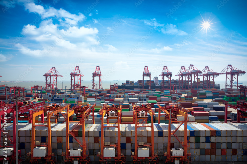 Closeup Industrial port with containers, Shanghai Yangshan deepwater port is a deep water port for container ships in Hangzhou Bay south of Shanghai, China. - obrazy, fototapety, plakaty 