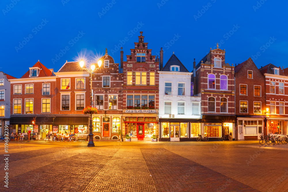 Typical Dutch houses on the Markt square in the center of the old city at night, Delft, Holland, Netherlands
