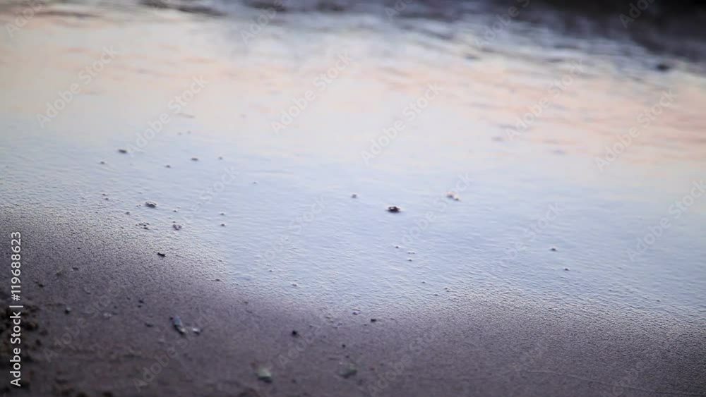 Heart drawn jn beach sand washed away by waves Heart drawn jn beach sand washed away by waves