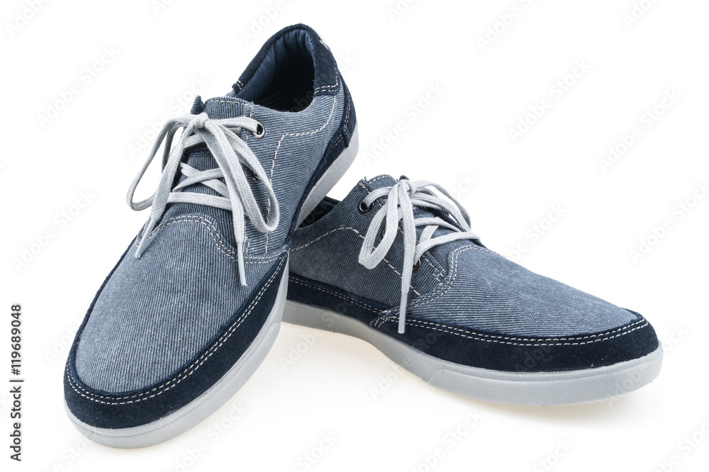 Picture of a pair of blue trainers over a white background Picture of a pair of blue trainers over a white background