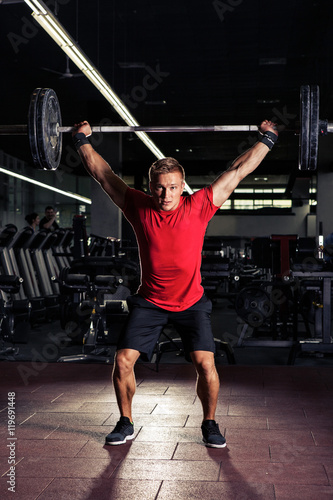 Young man at a crossfit gym photo