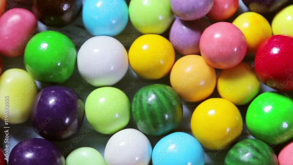 Multi-colored sweets, lollipops and chewing gum. Multi-colored sweets, lollipops and chewing gum.