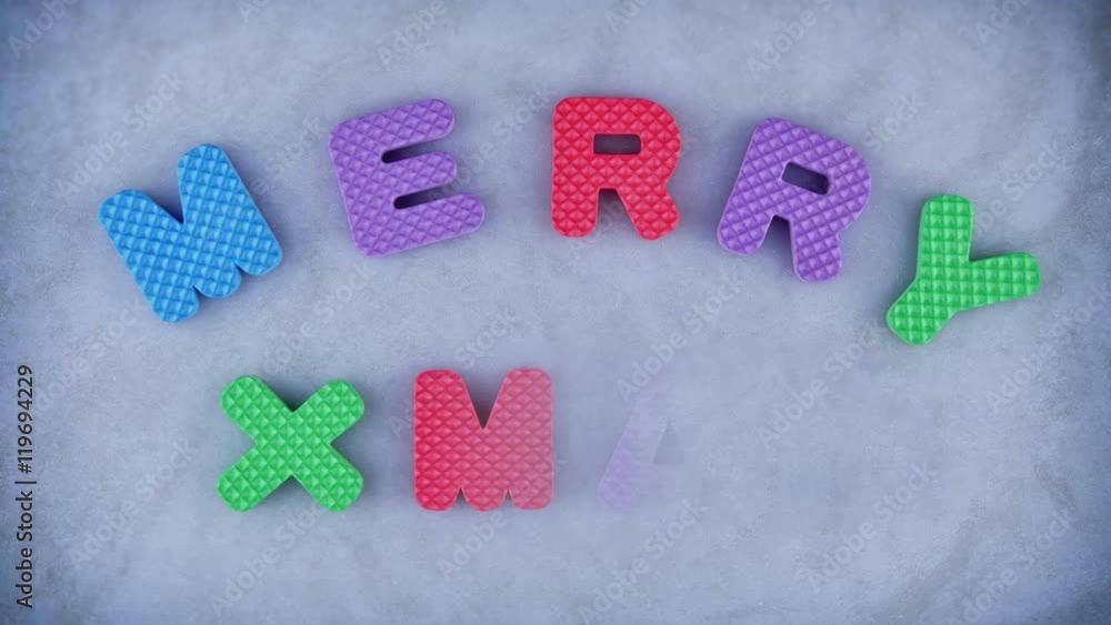 Words Merry Xmas appearing letter by letter with the blue texture for background. Different color letters. Words Merry Xmas appearing letter by letter with the blue texture for background. Different color letters.