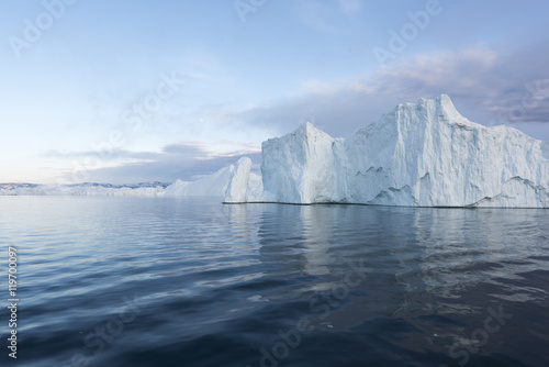 Huge and beautiful icebergs on arctic ocean in Greenland © murattellioglu