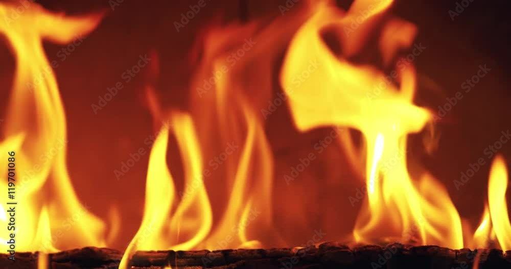 closeup fire flames in fireplace slow motion closeup fire flames in fireplace slow motion