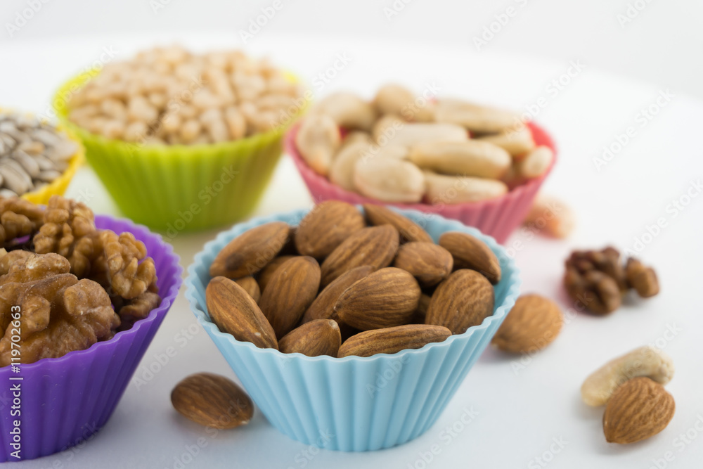 Nuts in cupcake's molds. Shallow depth of field Nuts in cupcake's molds. Shallow depth of field