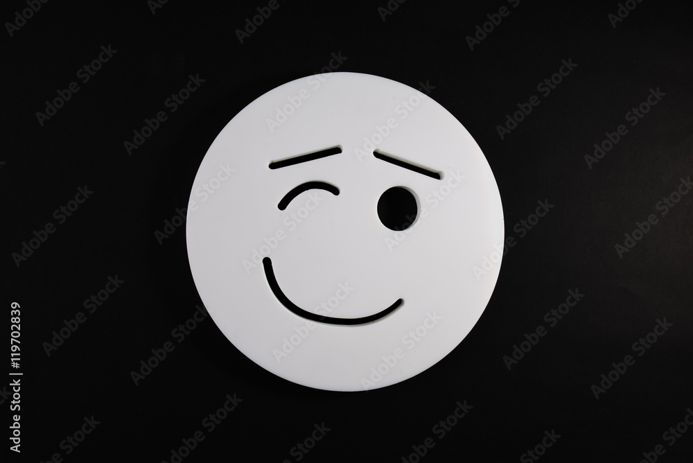 Smiley face on a black background,Top View shot. Stock Photo | Adobe Stock
