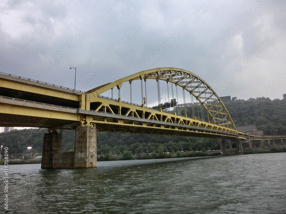 Yellow bridge with arch in Pittsburgh, Pennsylvania 