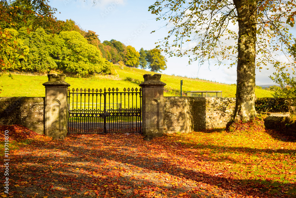 Old, beautiful iron gate at the old Scottish church in Autumn Old, beautiful iron gate at the old Scottish church in Autumn