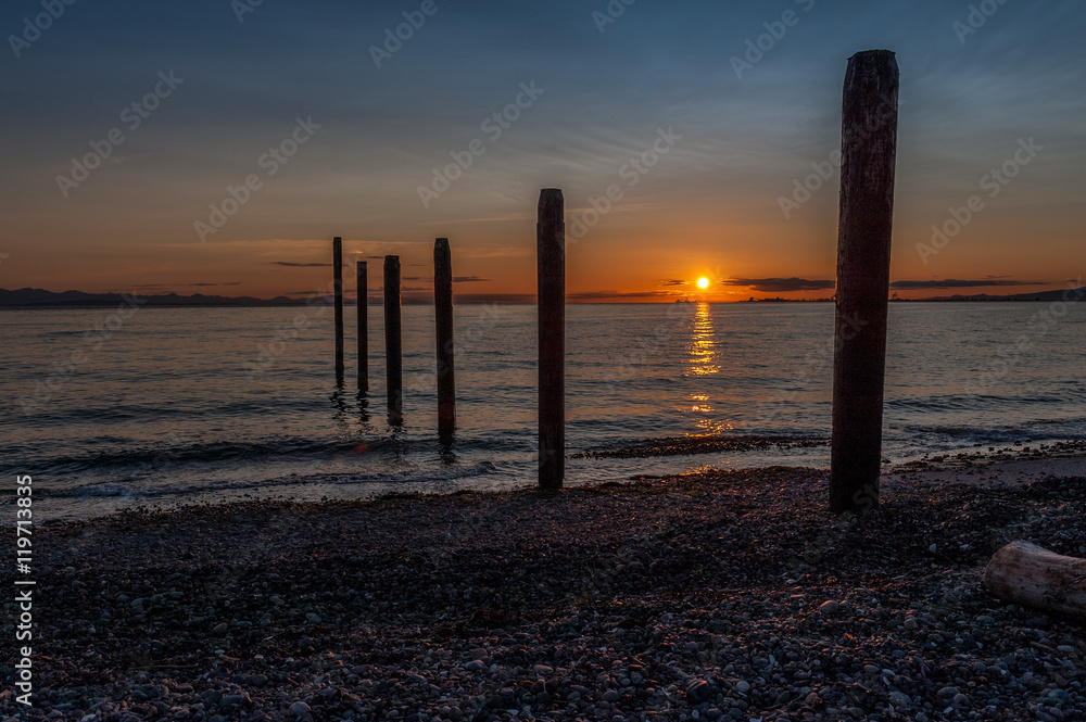 pier remnants silhouettes at sunset Point Roberts, Washington state pier remnants silhouettes at sunset Point Roberts, Washington state