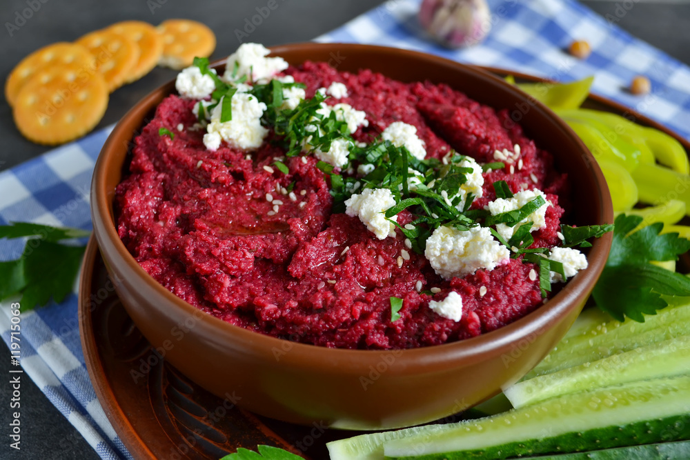 Appetizer of chickpeas - hummus with beetroot, vegetables and fe Appetizer of chickpeas - hummus with beetroot, vegetables and fe