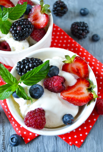 Vanilla ice cream with blueberries, raspberries and strawberries