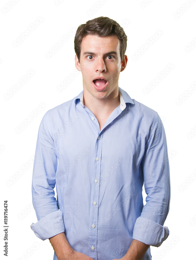 Young man with a gesture of shock on white background Young man with a gesture of shock on white background