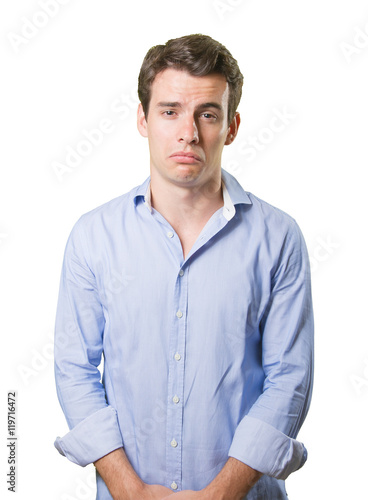 Worried young man with a gesture of depression on white background