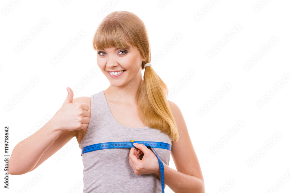 woman measuring her chest breasts isolated woman measuring her chest breasts isolated